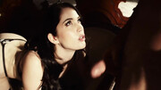 Thin brunette in stockings fucks in a moody vid