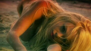 Outdoor beach sex makes busty blonde lose her mind