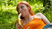 Redhead Emma Korti plays by herself in outdoor scenes until she comes