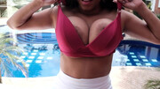 Appealing Latina mom is ready to pull down her top for a better view
