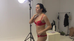 Lingerie model is being teased into stripping naked