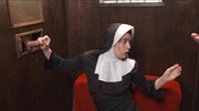 Submissive nun working all the hard dicks at the gloryhole