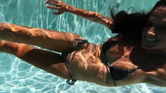 Diving in the pool and playing with a big dildo in HD