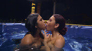 Dazzling lesbians make out in the swimming pool
